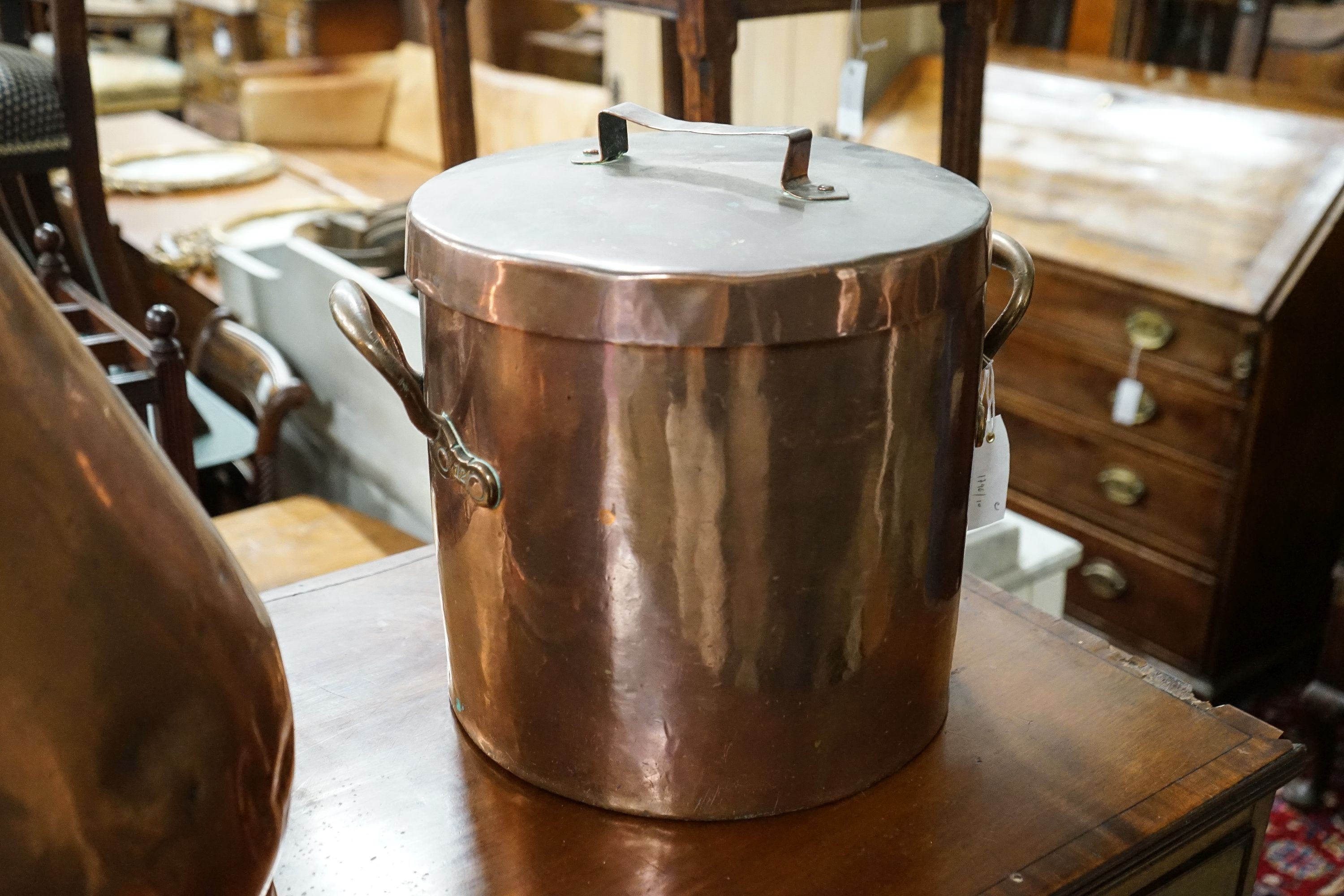 A Victorian copper jug measure, together with a Victorian copper harvest flagon, larger 48cm high